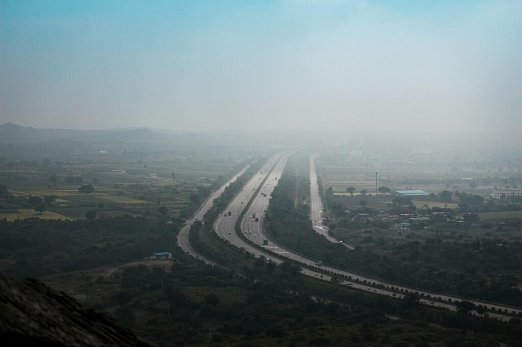 Drone shot of a highway in Hyderabad, showcasing transportation and infrastructure.